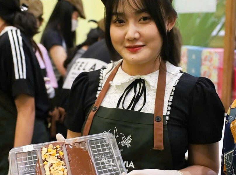 A girl shows off her homemade chocolate at Alluvia shop, 79 Le Loi street, District 1, Ho Chi Minh City, February 13, 2025. Photo courtesy of Alluvia.