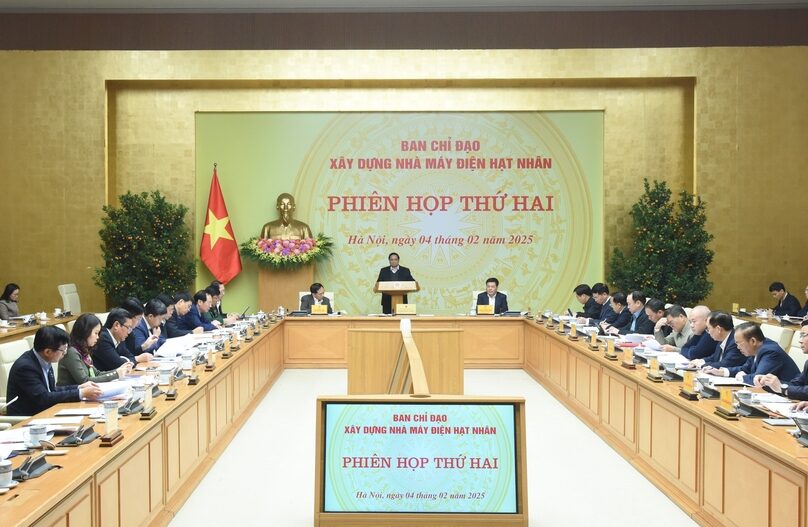 PM Pham Minh Chinh (standing) chairs a meeting of the national steering committee on nuclear power plant construction in Hanoi, February 4, 2025. Photo courtesy of Nhan Dan (The People) newspaper.