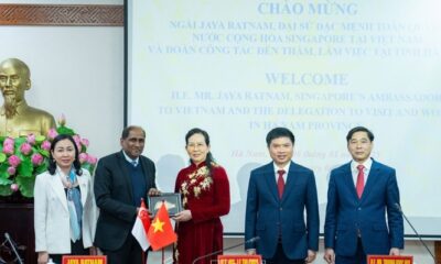 Le Thu Thuy (center), chief of Ha Nam's Party Committee; Ha Nam Chairman Truong Quoc Huy (second, right); Singaporean Ambassador to Vietnam Jaya Ratnam (second, left) at a meeing in Ha Nam province, northern Vietnam, January 6, 2025. Photo courtesy of Ha Nam newspaper.