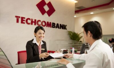 A customer conducts transactions at a branch of Techcombank. Photo courtesy of the lender.