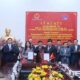 WHA chairperson Jareeporn Jarukornsakul (left, holding paper) and Thanh Hoa Chairman Nguyen Van Thi (right, holding paper) at a meeting in Thanh Hoa province, central Vietnam, on January 7, 2025. Photo courtesy of Thanh Hoa TV.