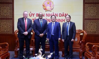 Ho Quoc Dung (right, second), chief of Binh Din's Party Committee, and PNE CEO Heiko Wuttke (left, second) at a meeting in Binh Dinh province, central Vietnam on March 5, 2025. Photo courtesy of Binh Dinh news portal.