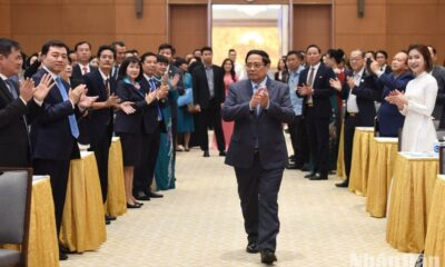 Prime Minister Pham Minh Chinh at the meeting with businesspeople in Hanoi on October 4. (Photo: Tran Hai)